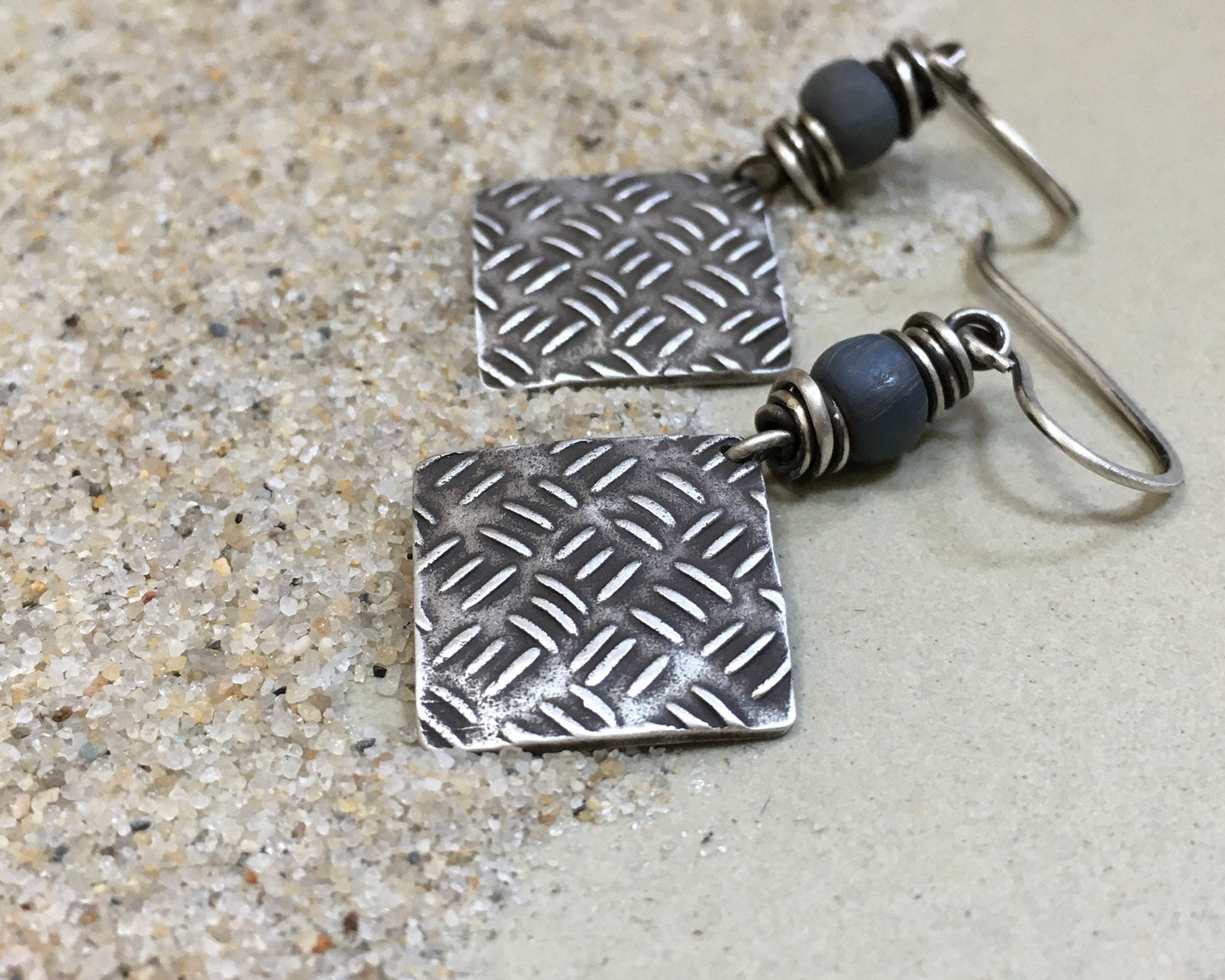 Sashiko cross stitch earrings in oxidized sterling silver with gray Java glass bead