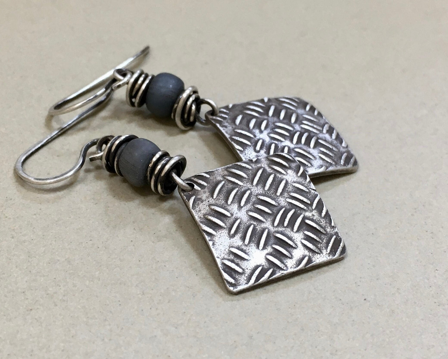 Sashiko cross stitch earrings in oxidized sterling silver with gray Java glass bead