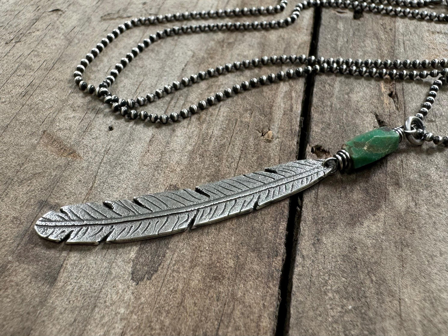 Tribal style silver feather necklace with turquoise on leather or chain