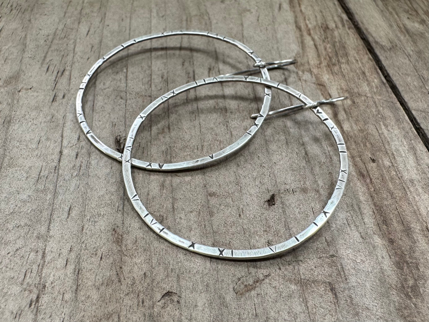 Large textured hoops in oxidized sterling silver