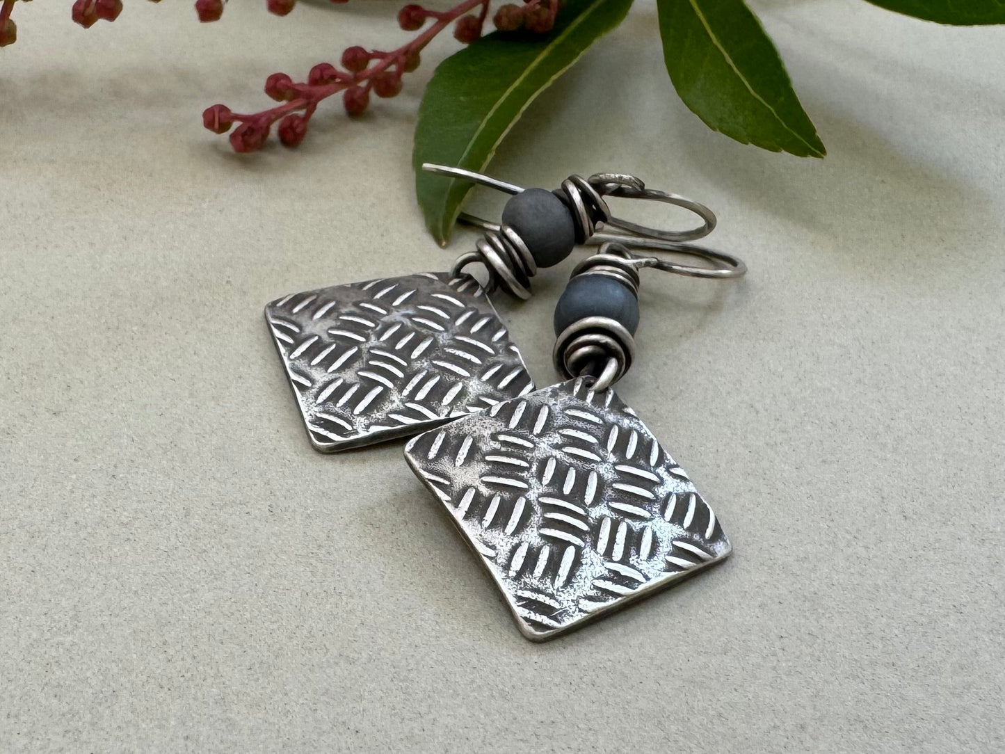 Sashiko cross stitch earrings in oxidized sterling silver with gray Java glass bead