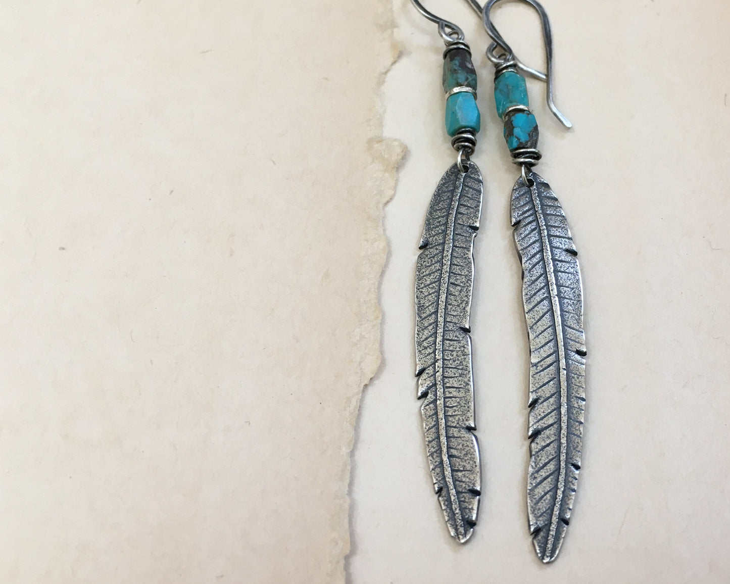 Rustic boho silver feather earrings with turquoise