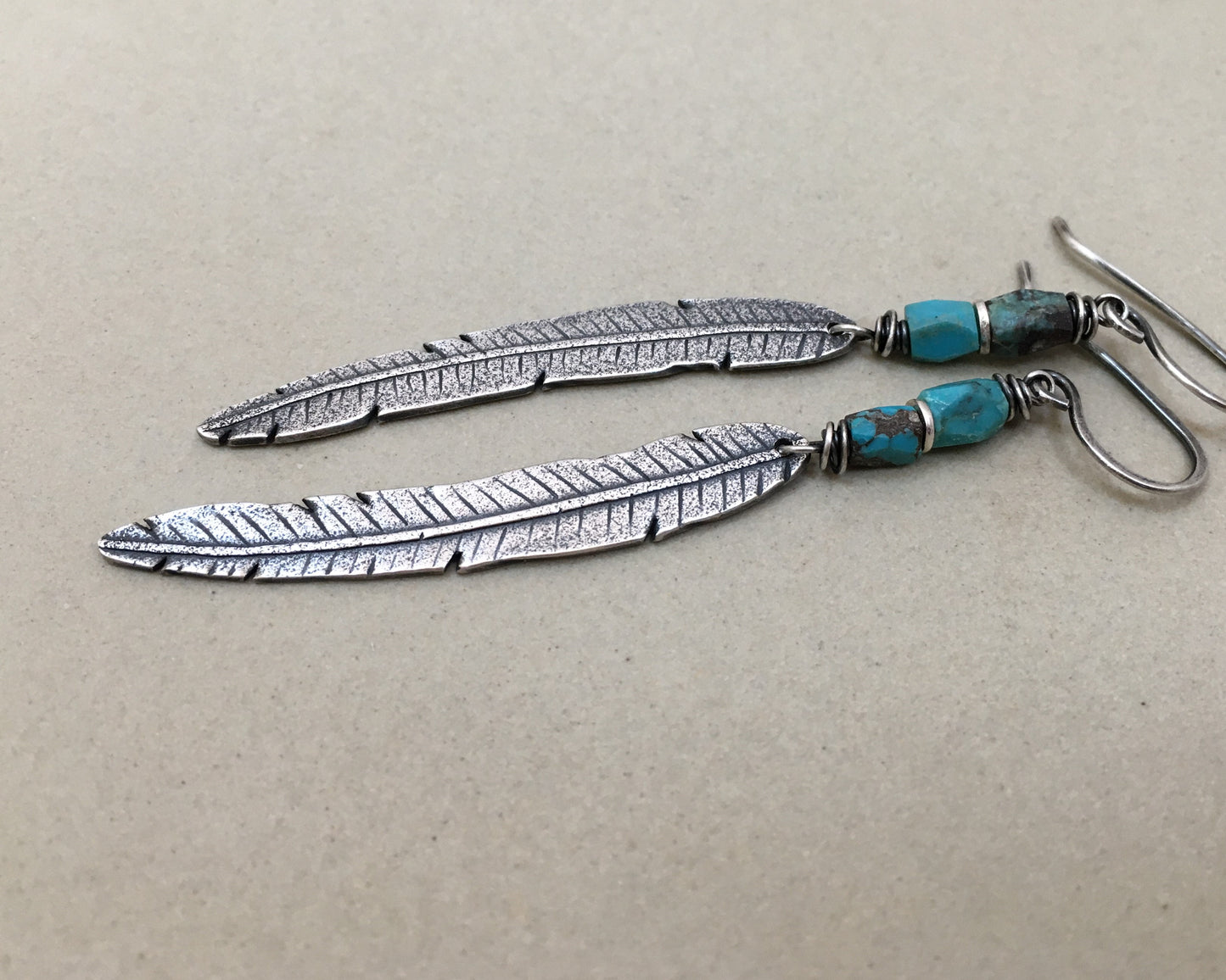 Rustic boho silver feather earrings with turquoise