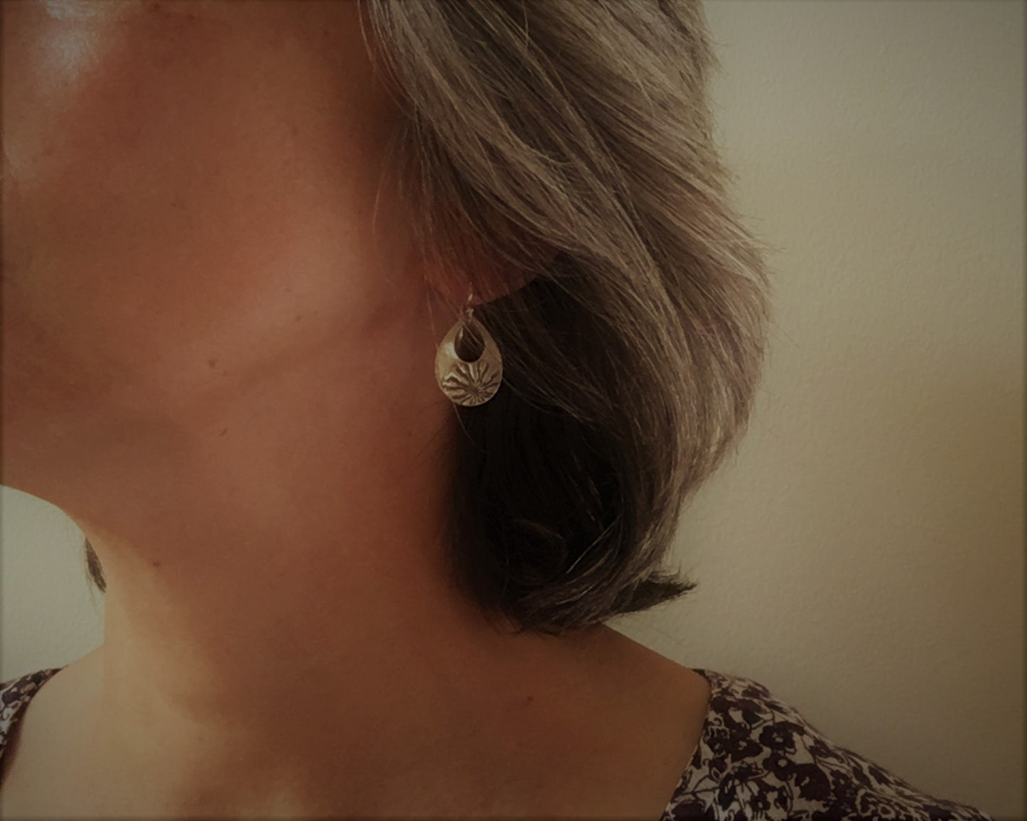 Silver mandala teardrop earrings from vintage button