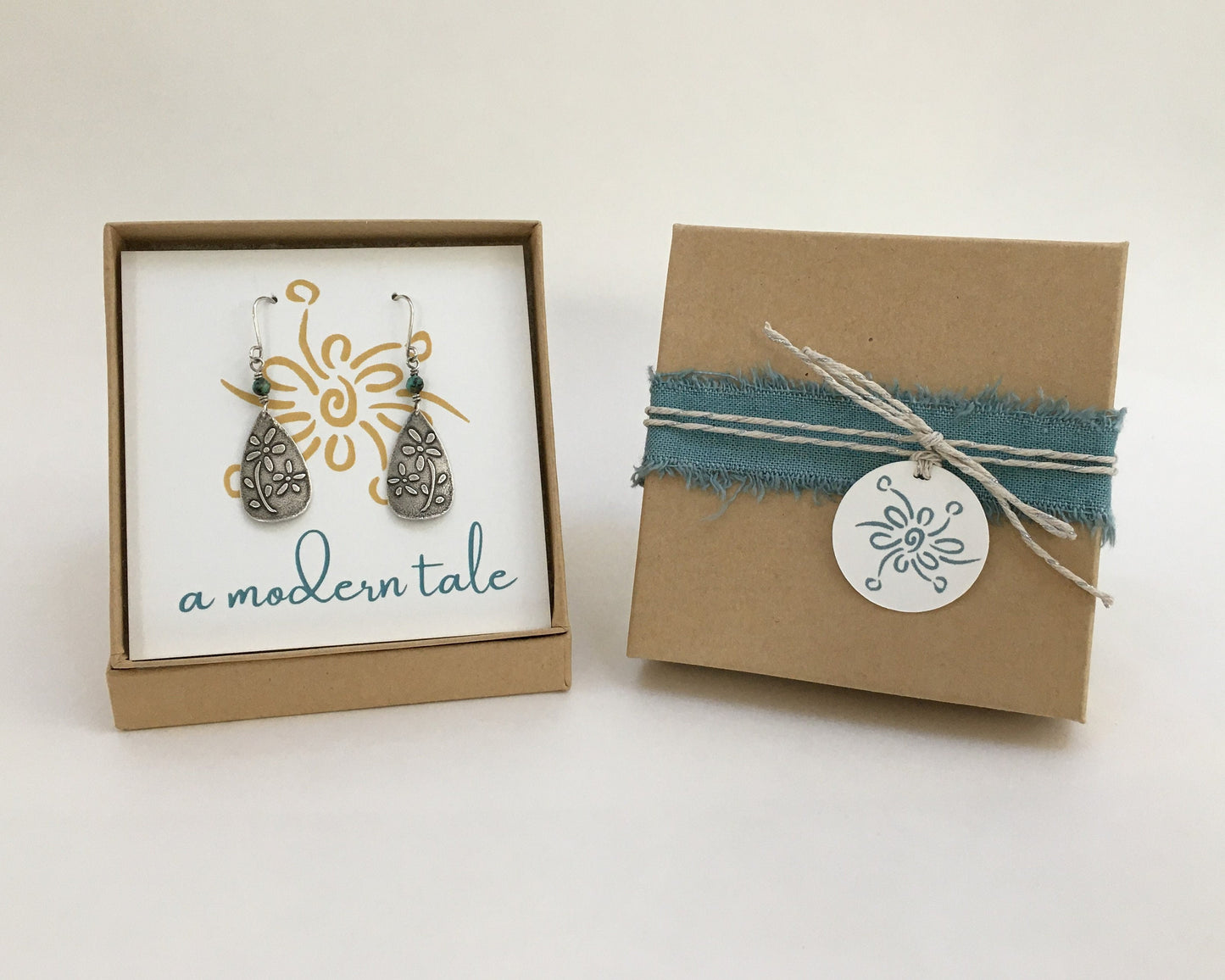 Multiple textured hoop earrings in oxidized sterling silver