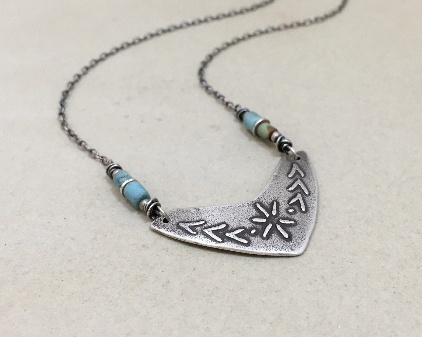 Tribal style beaded boomerang necklace
