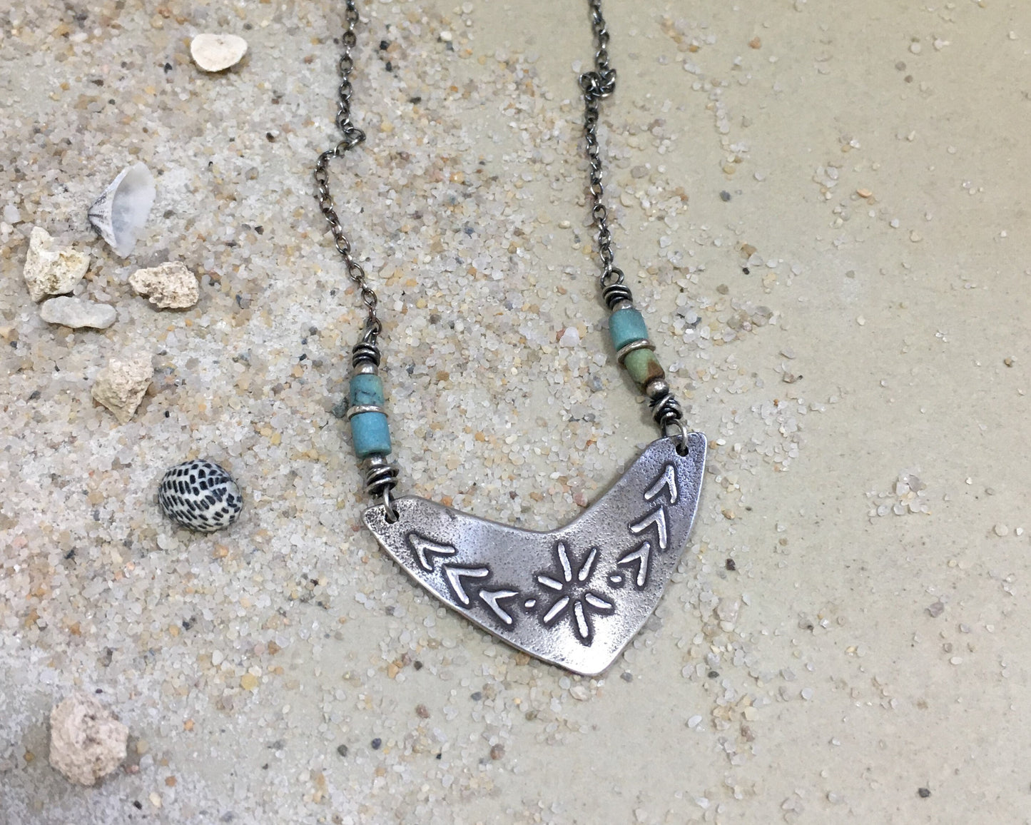 Tribal style beaded boomerang necklace