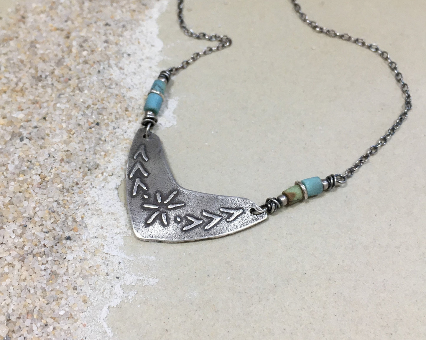 Tribal style beaded boomerang necklace