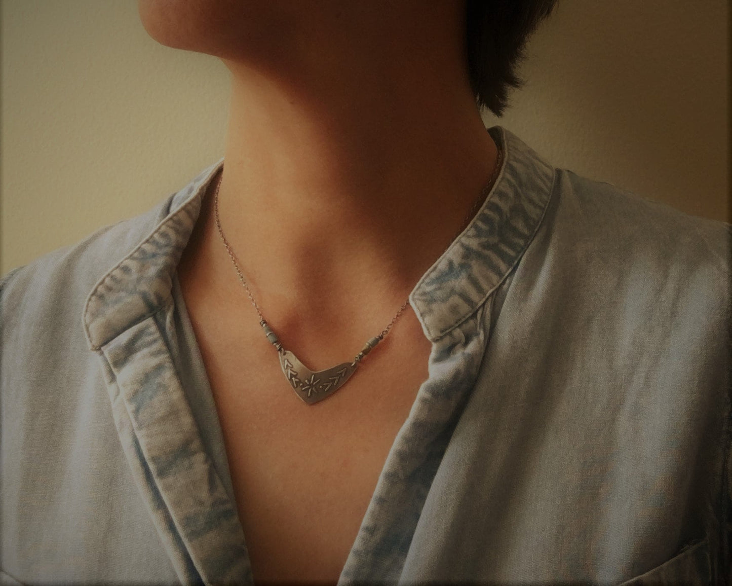 Tribal style beaded boomerang necklace