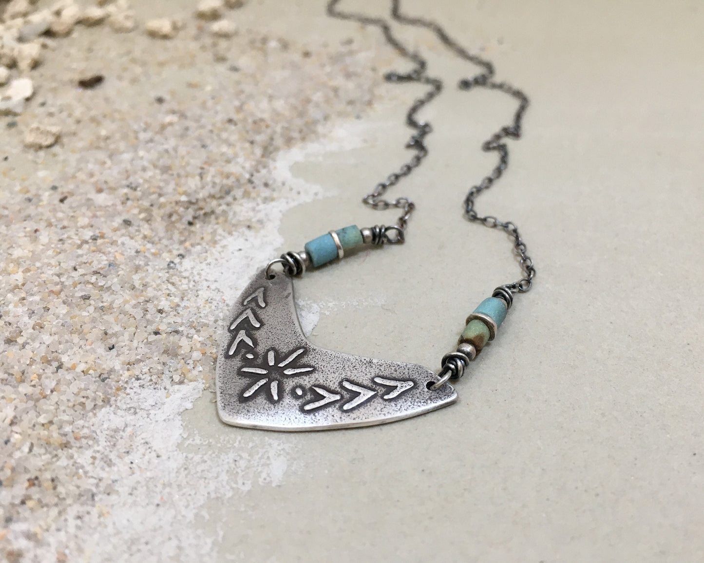 Tribal style beaded boomerang necklace