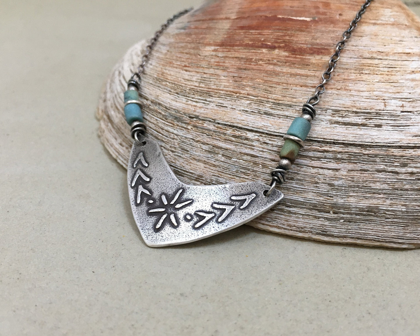Tribal style beaded boomerang necklace