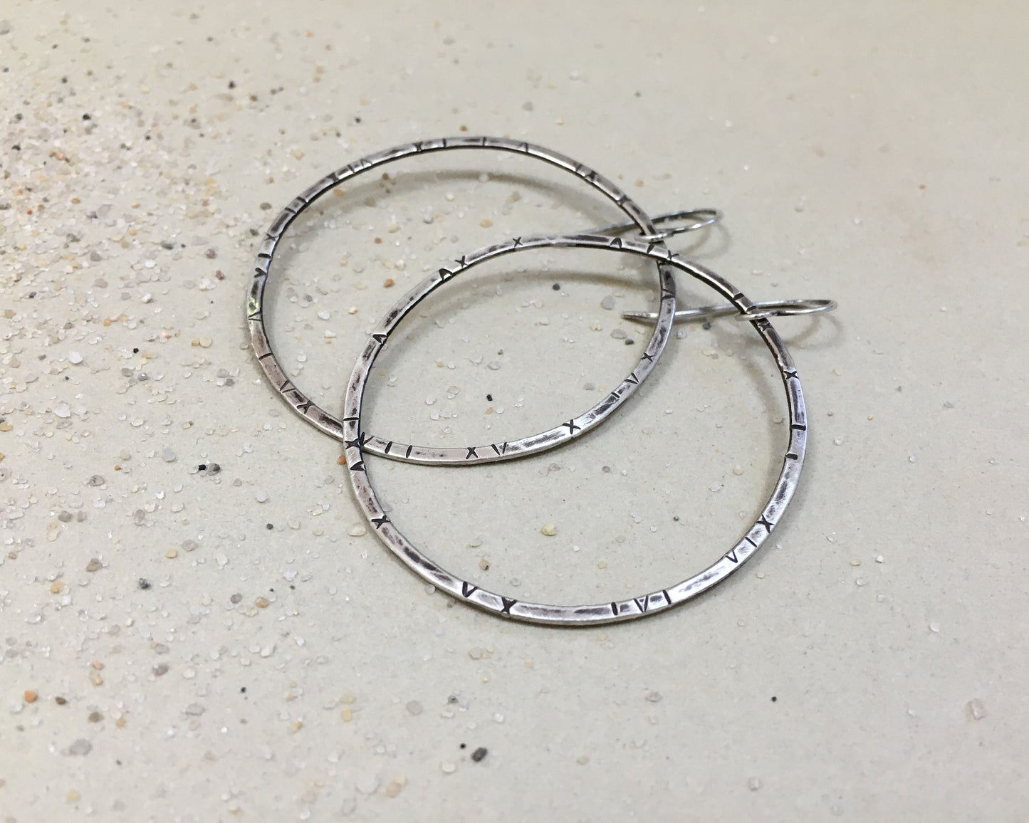 Large textured hoops in oxidized sterling silver