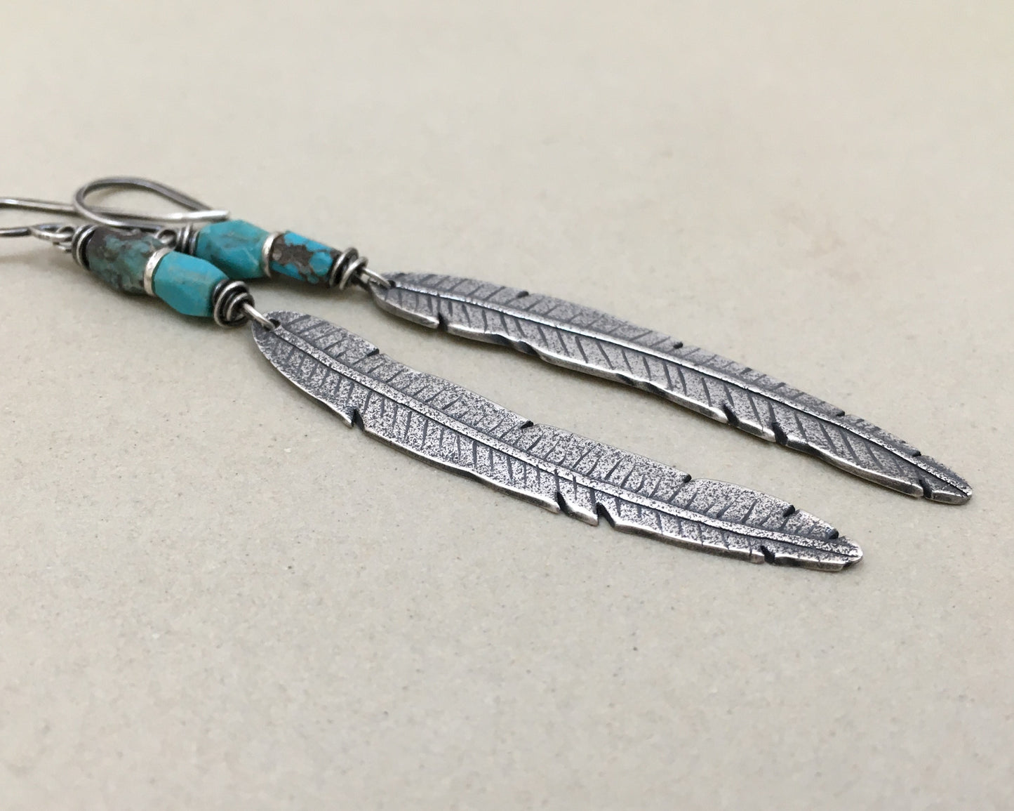 Rustic boho silver feather earrings with turquoise