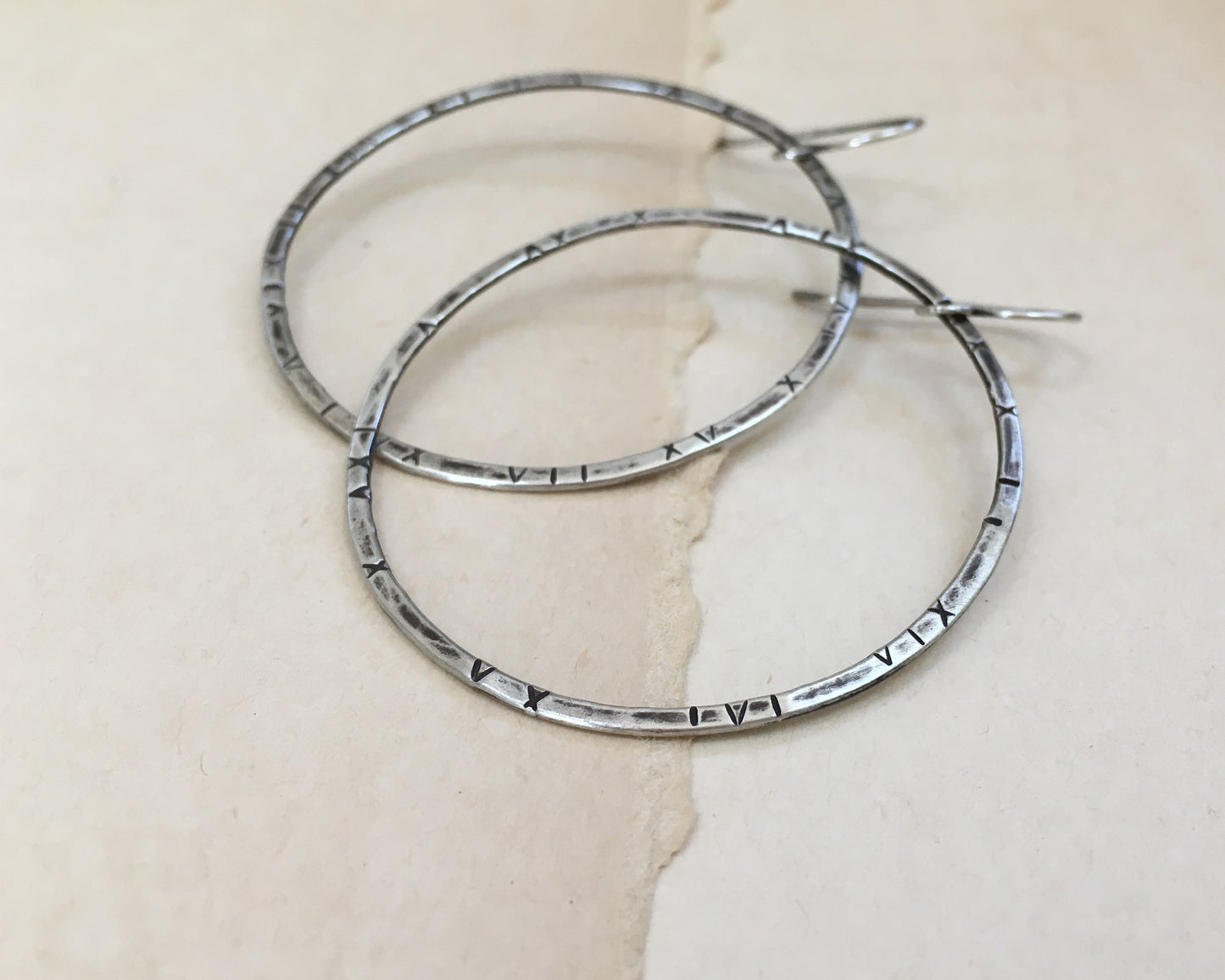 Large textured hoops in oxidized sterling silver
