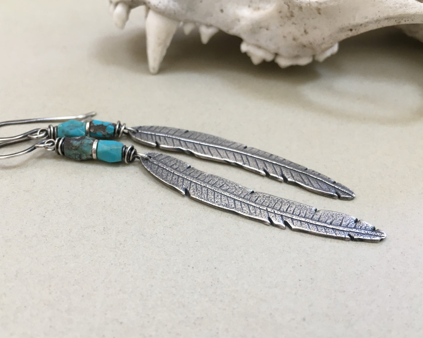 Rustic boho silver feather earrings with turquoise