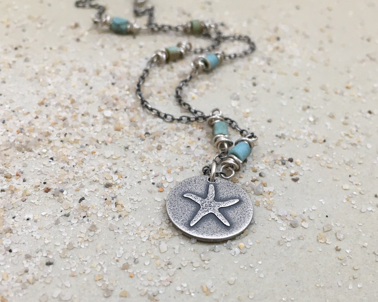 Silver starfish necklace on beaded chain