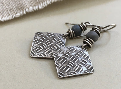 Sashiko cross stitch earrings in oxidized sterling silver with gray Java glass bead
