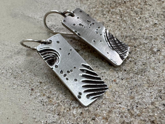 Silver mismatched seashell and sand earrings