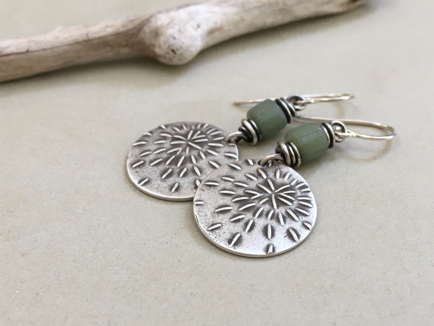 Silver starburst sashiko stitch earrings with seafoam green Java glass