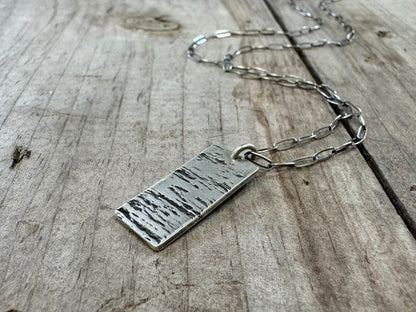 Minimalist silver wood grain dog tag necklace