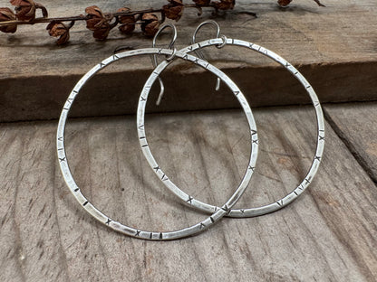 Large textured hoops in oxidized sterling silver