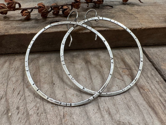 Large textured hoops in oxidized sterling silver