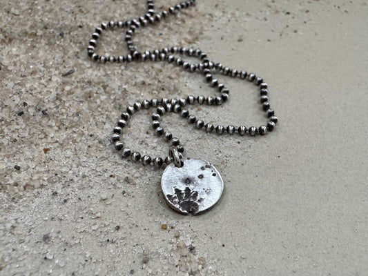 Small silver shell and sand necklace