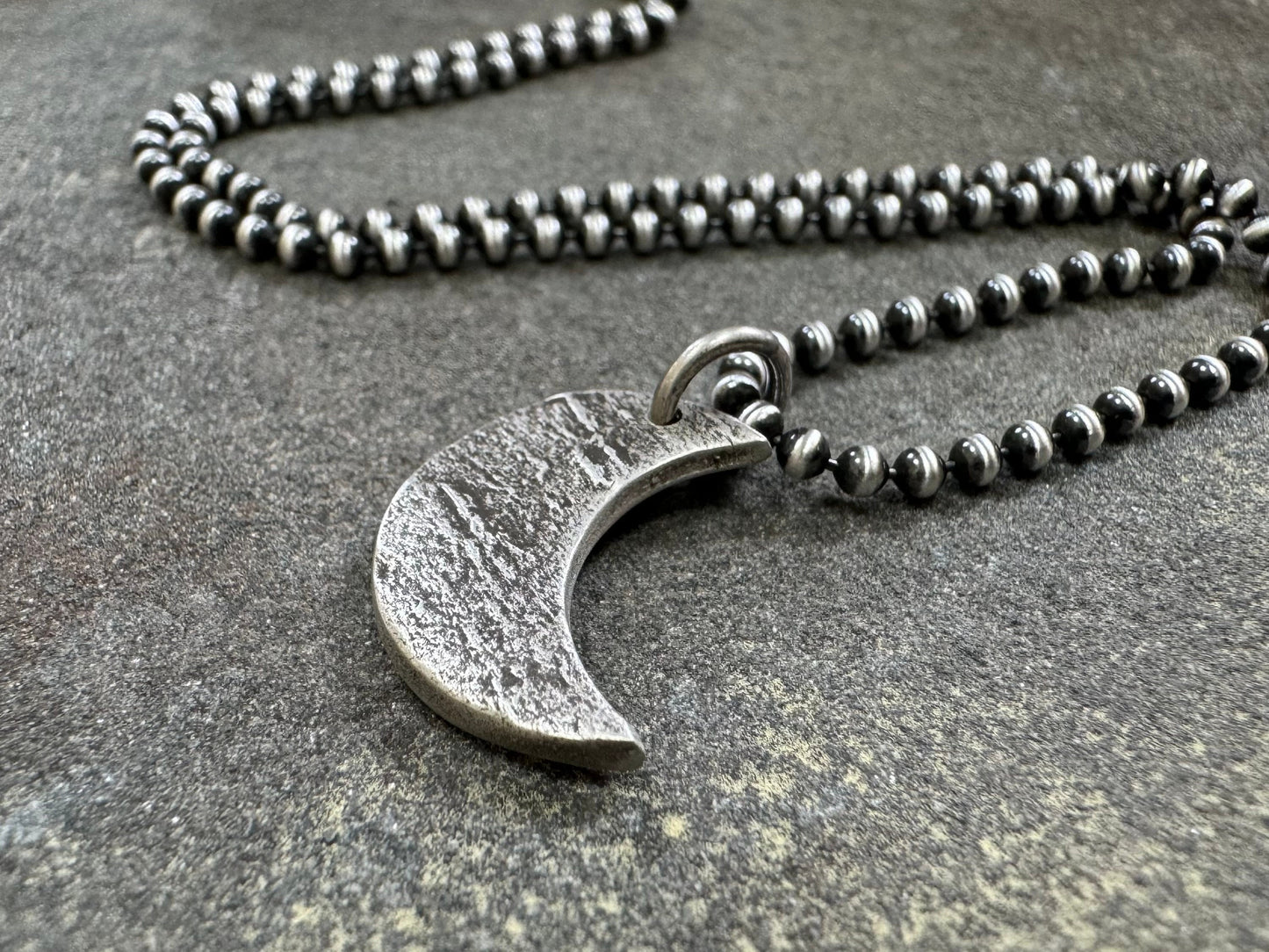 Chunky rock textured silver crescent moon necklace