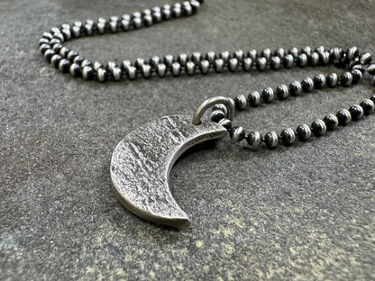 Chunky rock textured silver crescent moon necklace