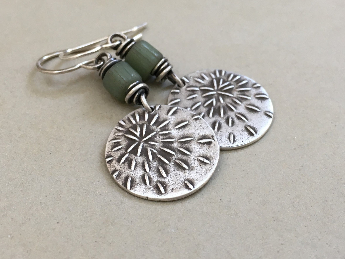 Silver starburst sashiko stitch earrings with seafoam green Java glass