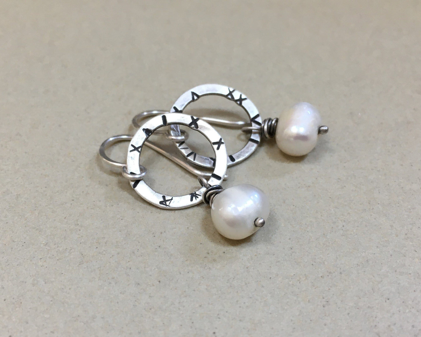 Small textured silver hoops with freshwater pearls