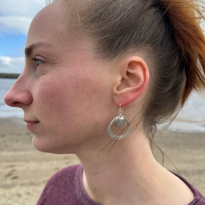 Silver seashell statement earrings with beach sand inclusions