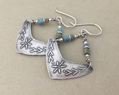 Silver boomerang earrings with blue stone beads
