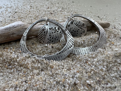 Silver seashell statement earrings with beach sand inclusions