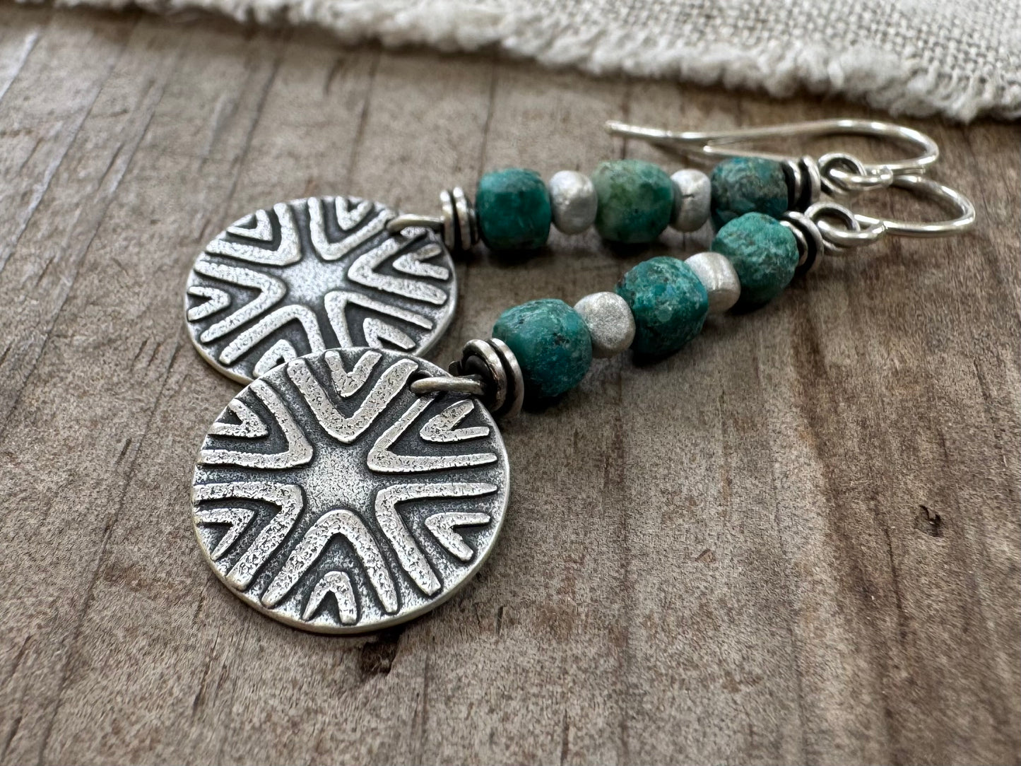 Tribal-style geometric design with turquoise bead stack