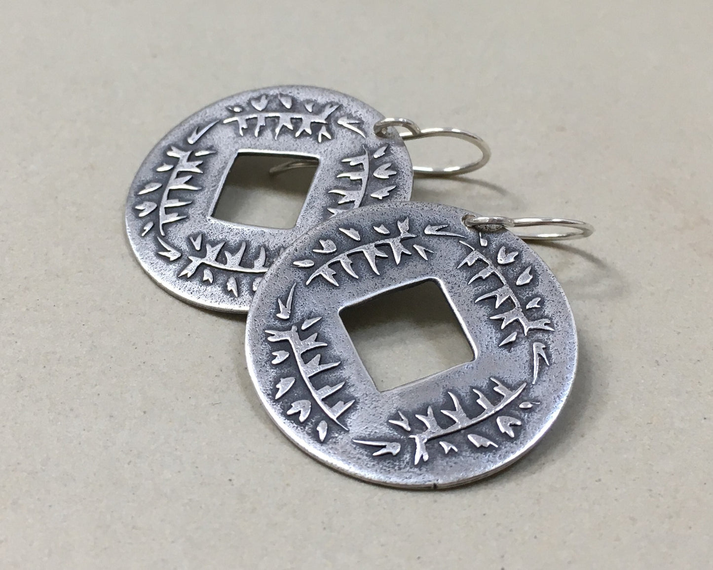 Pine branch coin earrings in oxidized sterling silver
