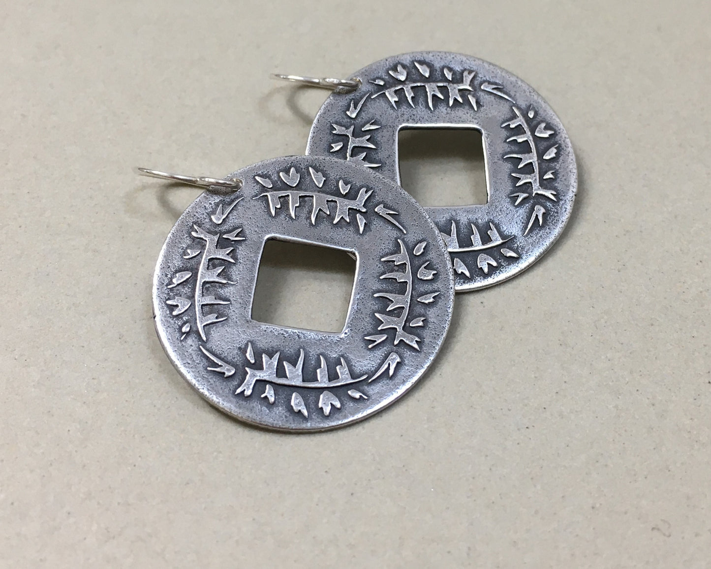 Pine branch coin earrings in oxidized sterling silver