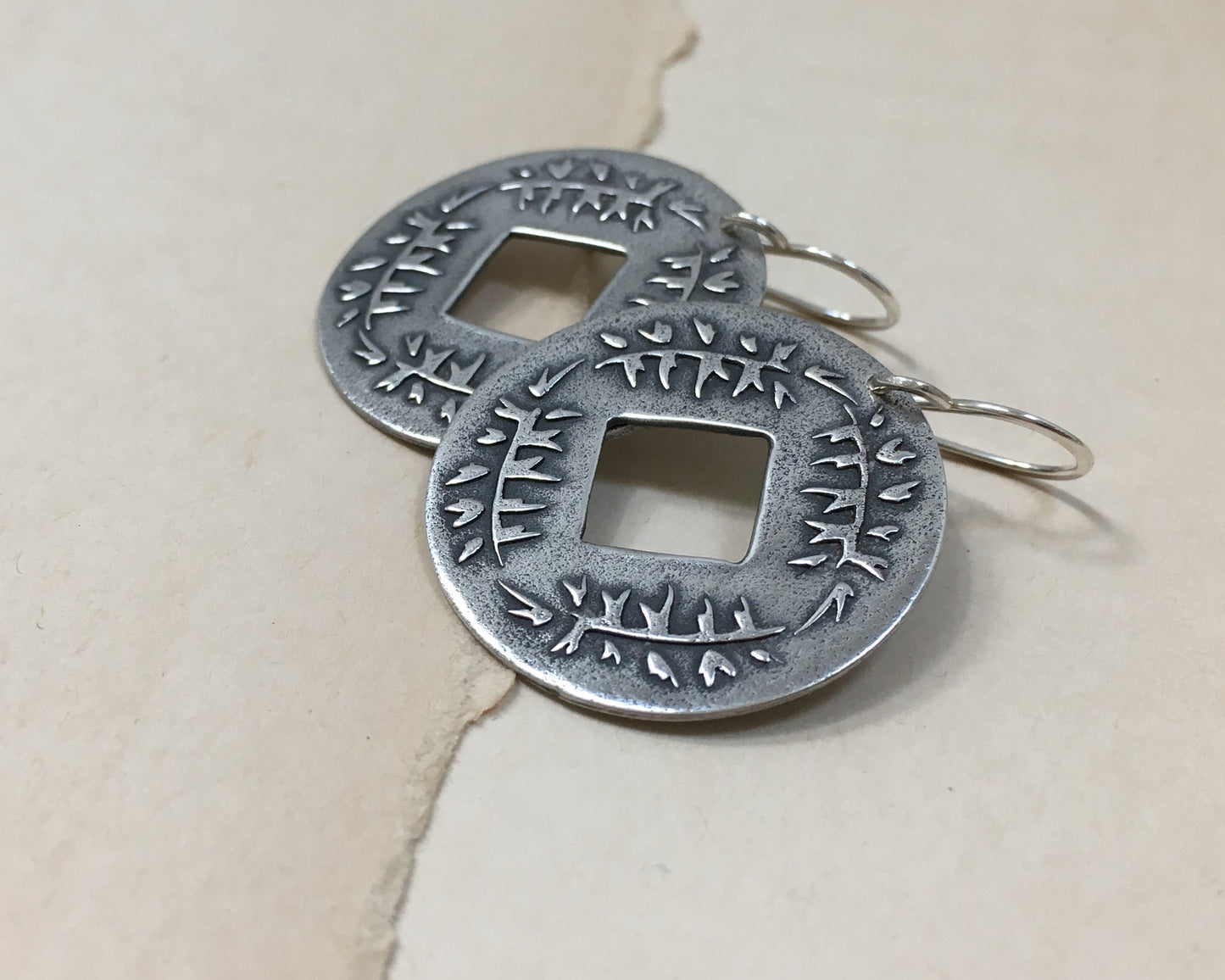 Pine branch coin earrings in oxidized sterling silver