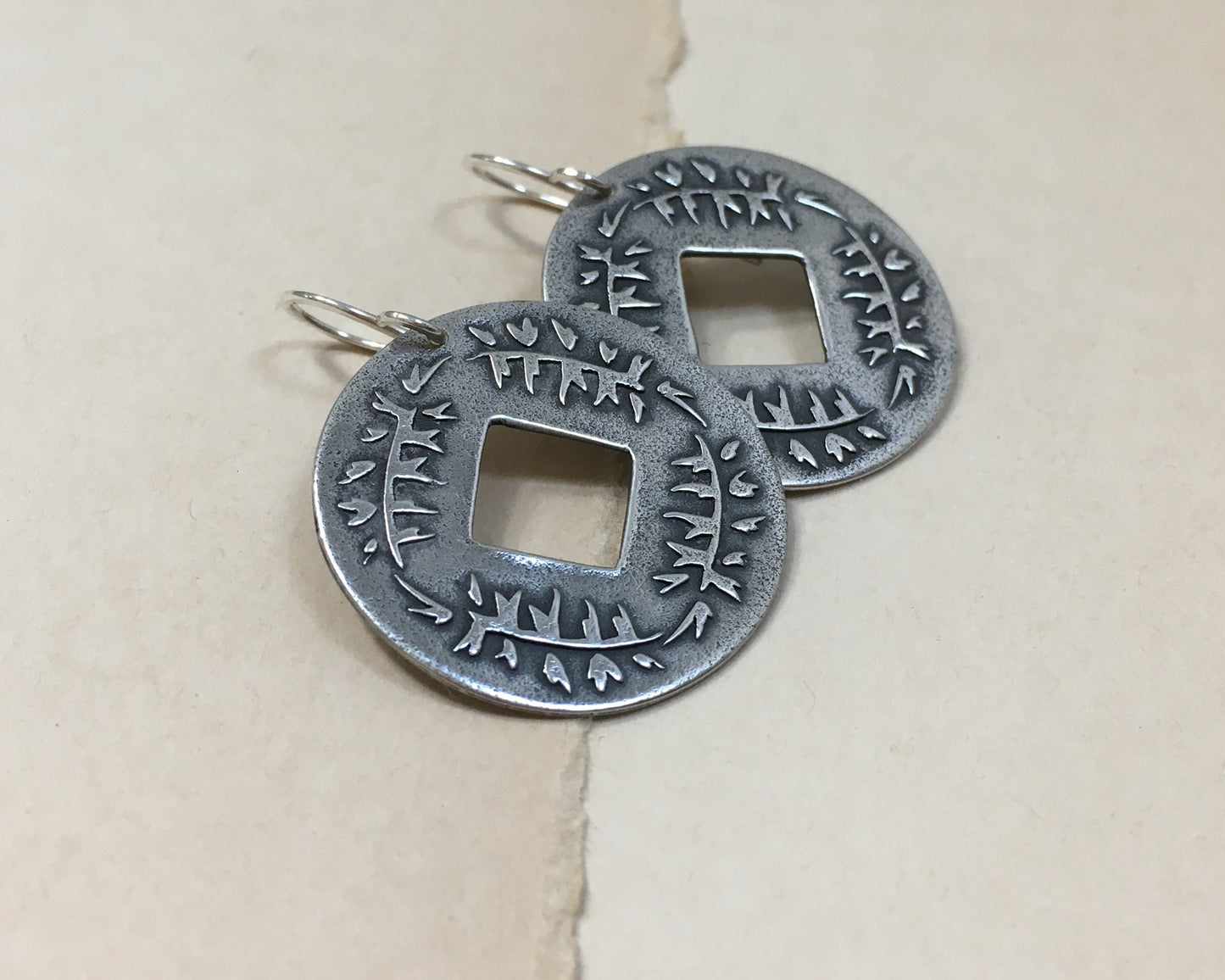 Pine branch coin earrings in oxidized sterling silver