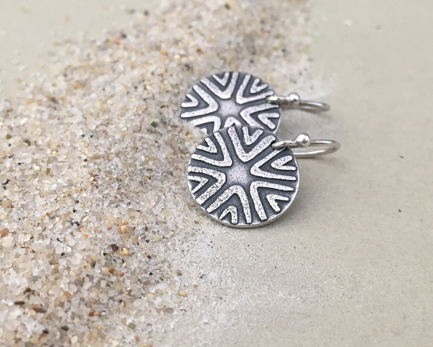 Primitive geometric discs in oxidized sterling silver