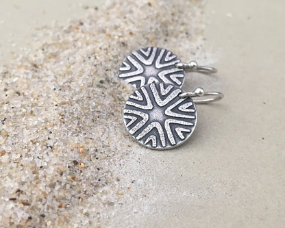 Primitive geometric discs in oxidized sterling silver