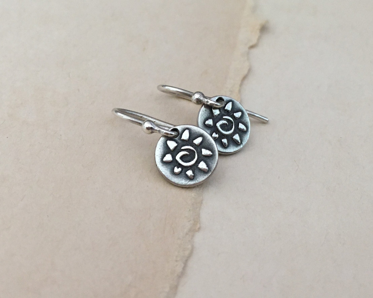 Tiny primitive sun earrings in oxidized sterling silver
