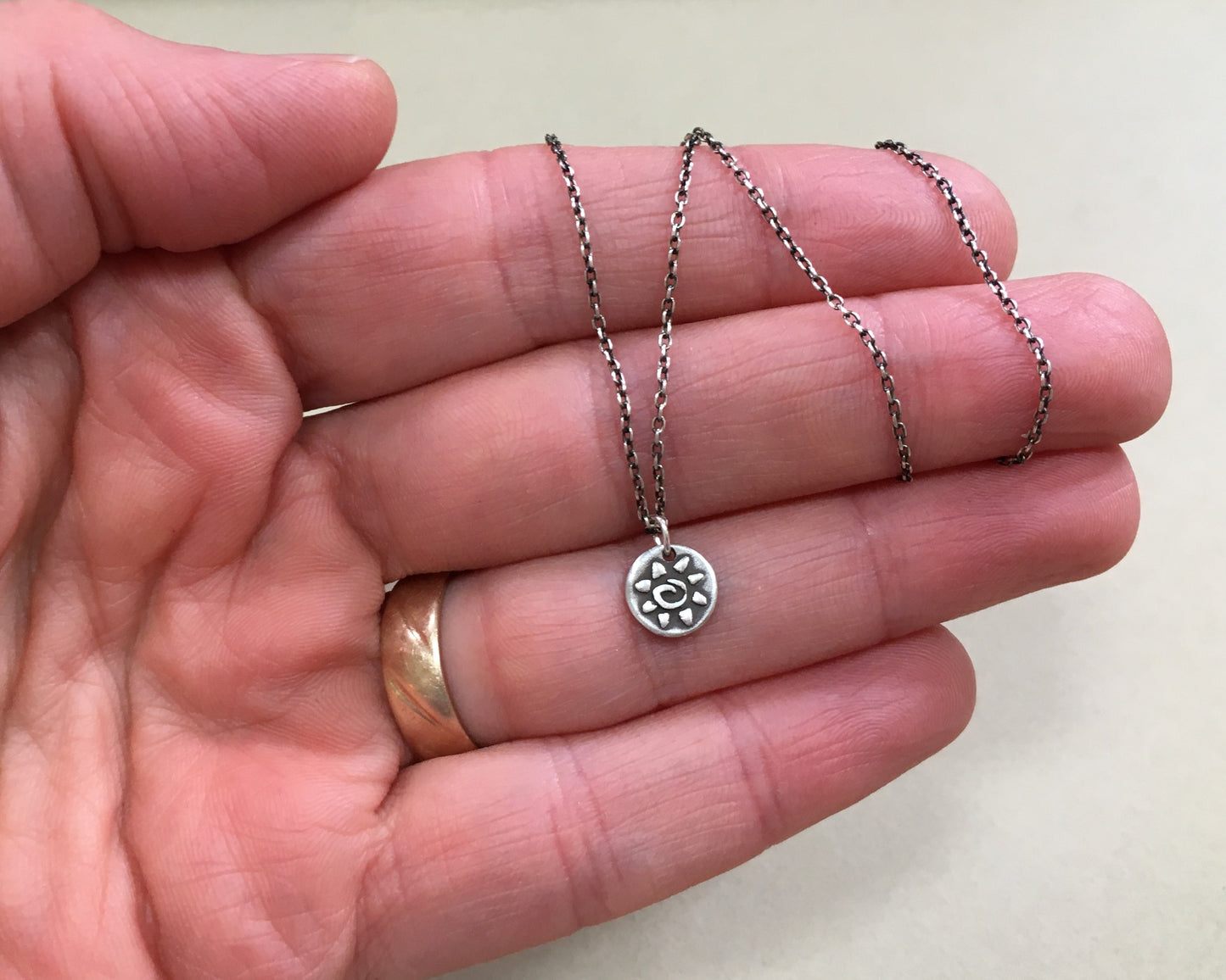 Tiny tribal style sun necklace in oxidized sterling silver