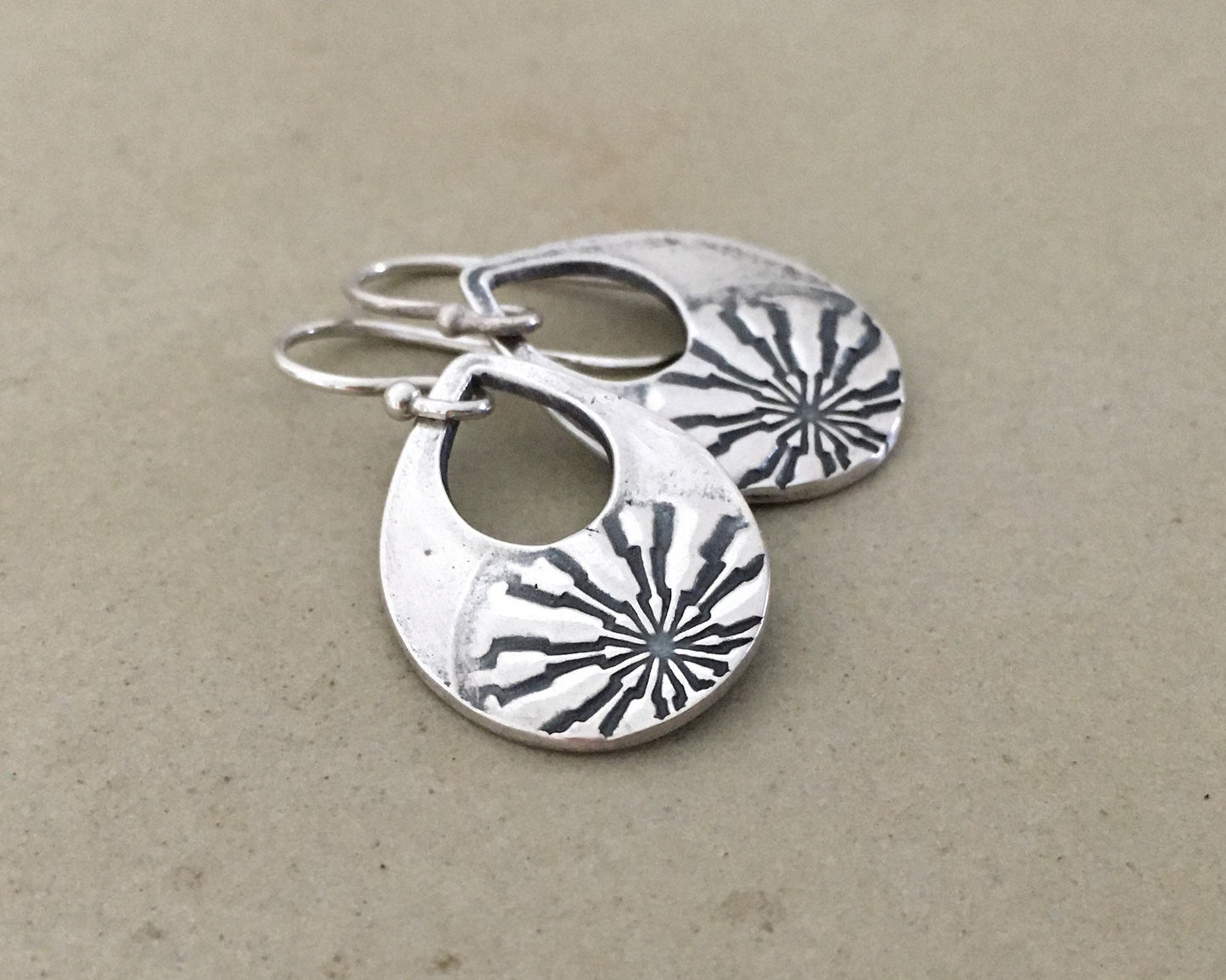 Silver mandala teardrop earrings from vintage button