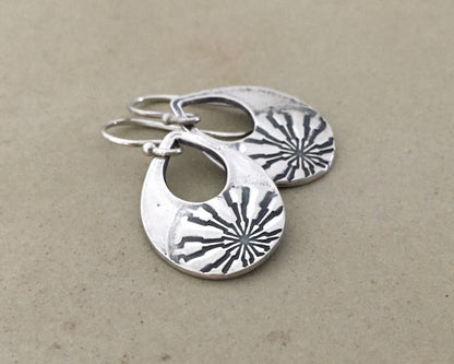 Silver mandala teardrop earrings from vintage button