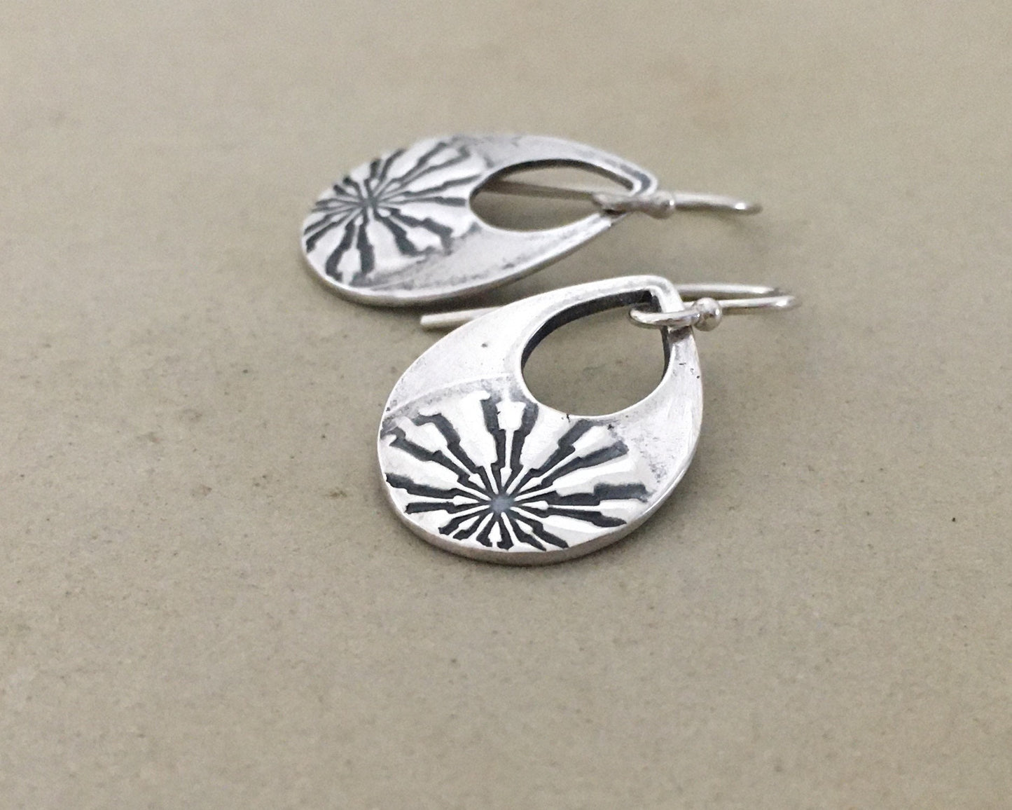 Silver mandala teardrop earrings from vintage button