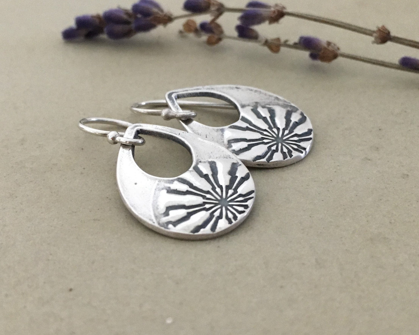 Silver mandala teardrop earrings from vintage button