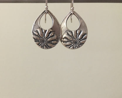 Silver mandala teardrop earrings from vintage button