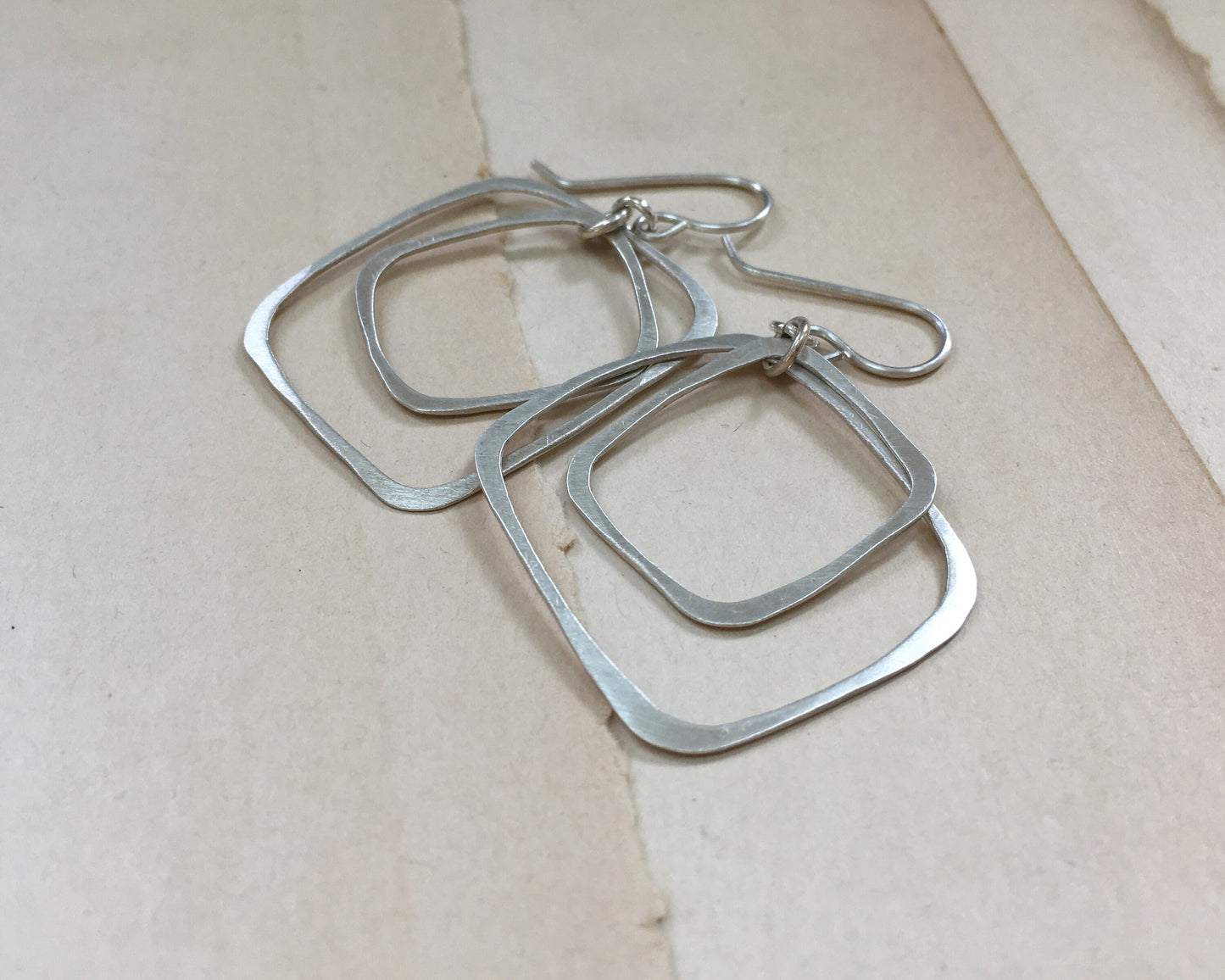 Silver double rectangle hoops in brushed satin finish