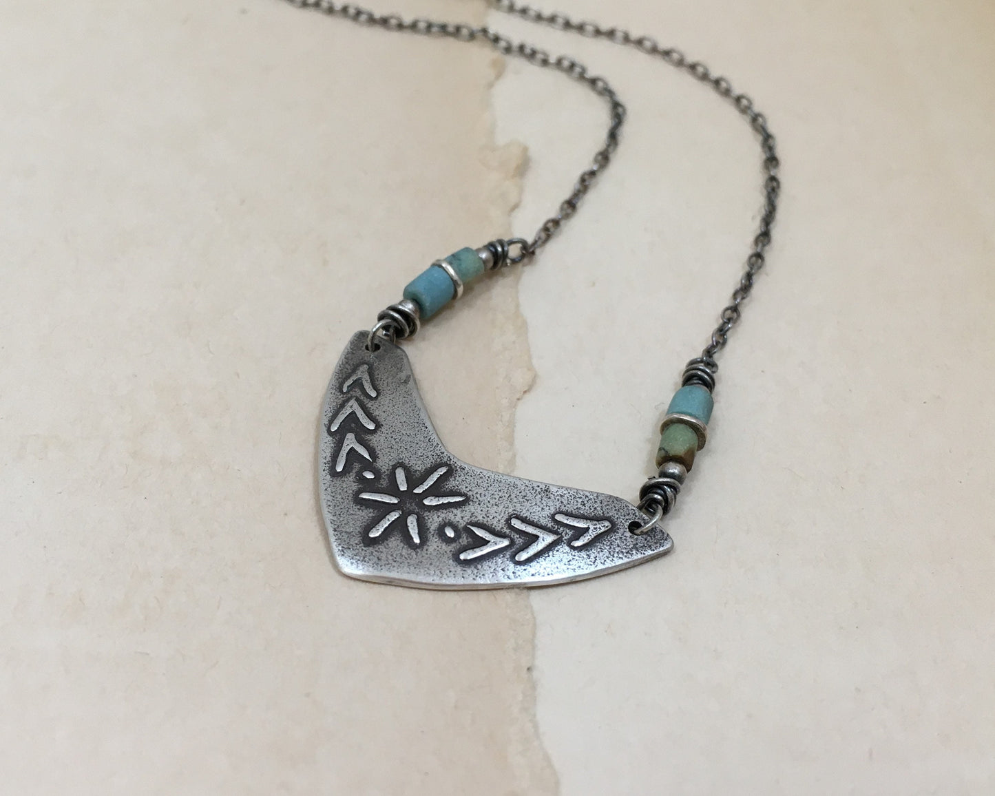 Tribal style beaded boomerang necklace